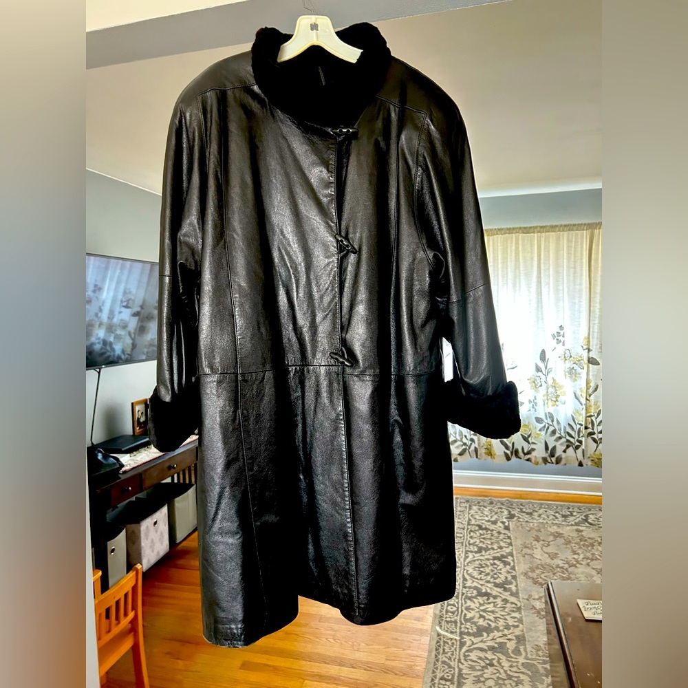 Black leather swing coat with sheared, mink removable liner